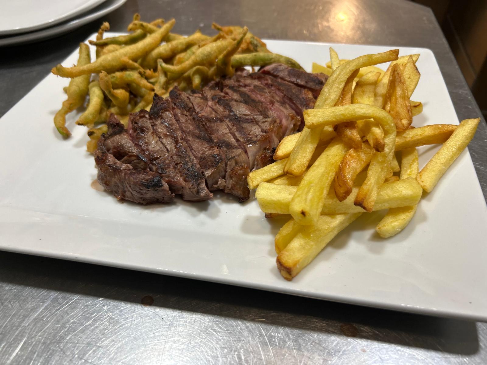 Horno leña carne roja asado The Waterboy Sports Bar Madrid